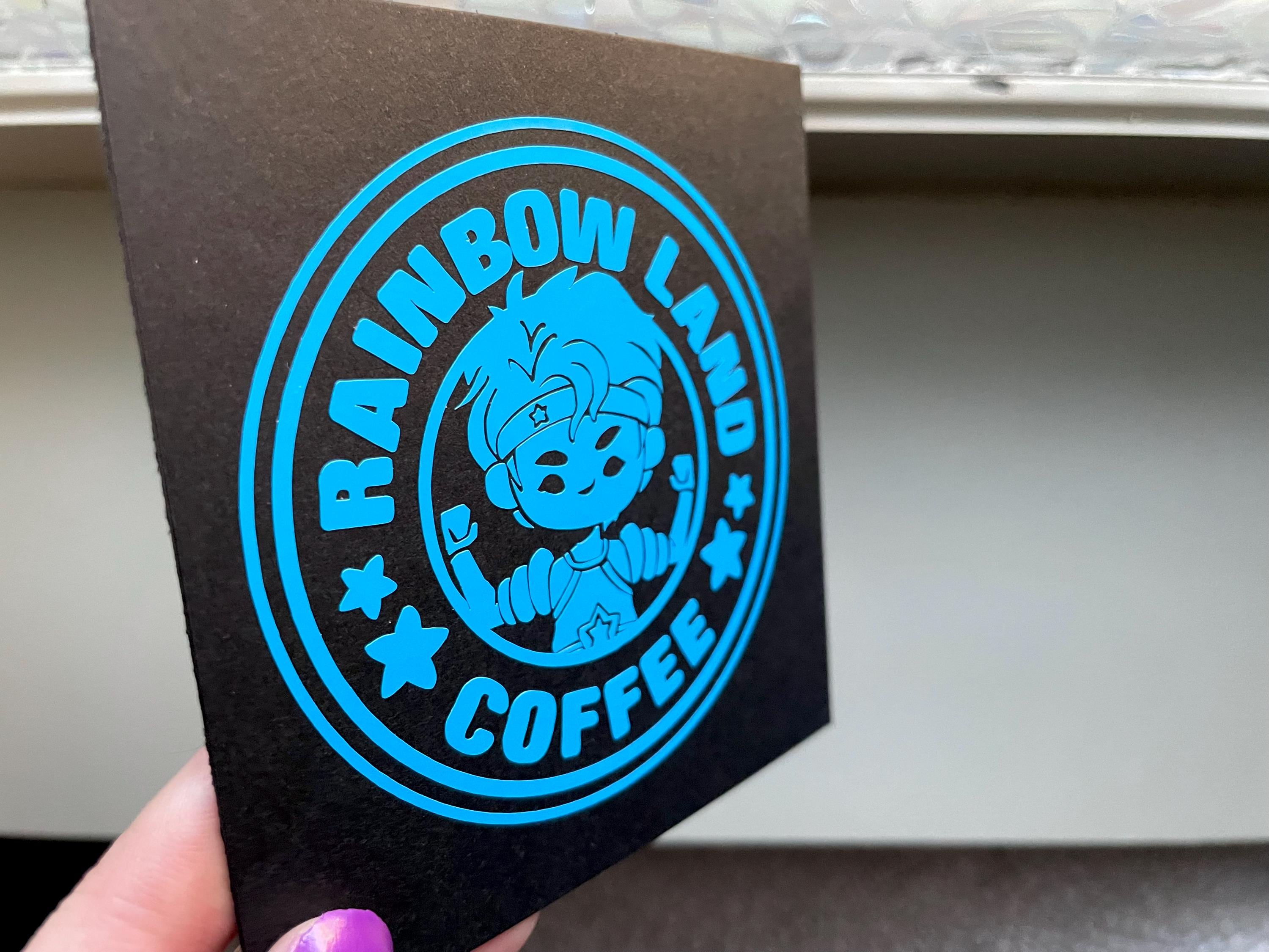Buddy Blue Vinyl Decal: Rainbow Land Coffee Label